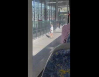 Women white top tiktok dance train station