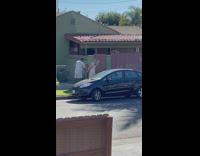 Man tape hands of girl cover face