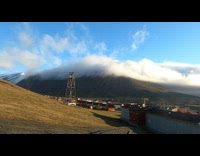 Collab DailyDoseOfInternet - Clouds roll down mountain timelapse houses tower