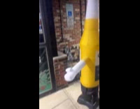 Woman convinced by waving Corona beer inflatable