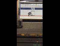 Guy crouch and jump fall on tracks