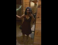 Woman dancing in mirror while other friend throwing up