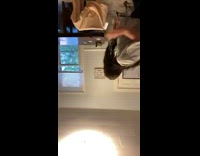 Girl stands on table tips it over
