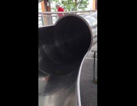 Man ride slide voice wobble inside tube