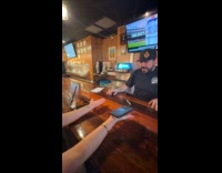 Man does magic trick using iphone flashlight