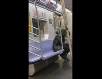 Black jacket person joker makeup green hair