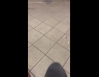 Woman black leather jacket walks at subway