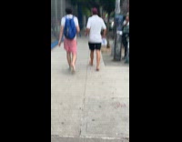 Collab winy - Man on sidewalk walking barefoot 