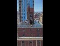 Water flooding the roof of an apartment building