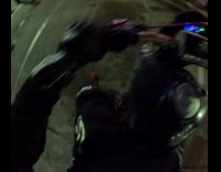 Motorcycle rider lifts back as he parks