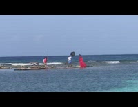 Girl red bikini cloth stand rock raft