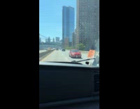 Collab WINY - Man drive red car backwards on highway