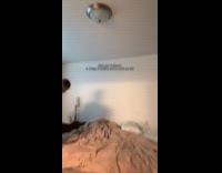 Dad throws spins kid onto bed