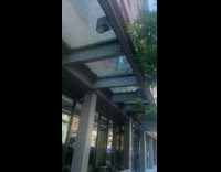 Mist sprinkling from rooftop building