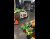 Hummingbird in supermarket feed from flower bouquet
