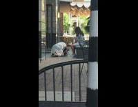 Woman white see thru scarf kneel down photo shoot