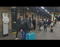 Man plays paper flip game at subway 