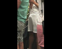 Guy in white shorts has a boner on subway train