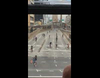 Large group of people ride bicycles train 