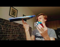 Guy spin book and solve rubiks cube