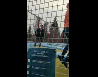 Guy bounce spin on trampoline wear hoodie