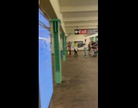 Bunch of people wait for subway system to work 