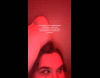 Cat on top of woman keeps licking