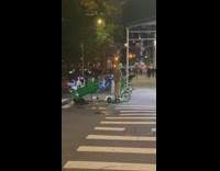 Guy has the pedals of his bike upside down