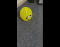 Yellow laugh emoji balloon  sway on floor