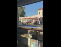 Dad poses for photo on the ground