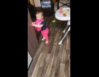 Baby stumbles while running and bumps head then cries