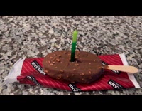 Candle blown on the popsicle ice cream