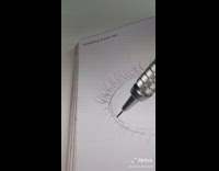 Guy draws raised arms inside eyeball 