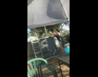 Black shirt girl cocktail drink pool backyard