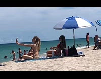 Two women bikini selfie at the beach