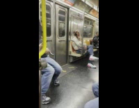 Man smokes inside the train with other passengers