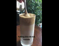 Dalgona coffee inside tall glass