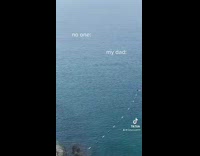 Guy films dad swimming out the safety boundary