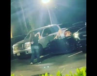 Woman brown tank top lie down car hood Part 1