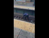 Guy jumping across train tracks fail 