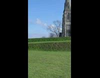 Handstand pose outside of church