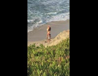 Yellow bikini mom poses beach little girl 