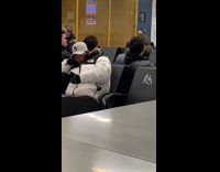 Guy on bench yells at security camera