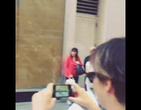 Dancer does breakdance while guy in Abraham Lincoln costume shakes hands 