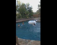 Guy scorpions when trying to dive onto swan floatie