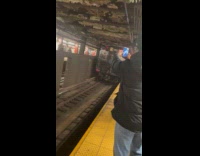 Collab Subway Creatures - Man stands on back part of train