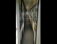 Hallway of train sunlight appears and disappears