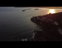 View of the Plymouth Beach at sunset via aerial drone