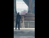 Grey jacket guy plays saxophone badly bridge 