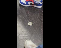 Condom on floor of subway